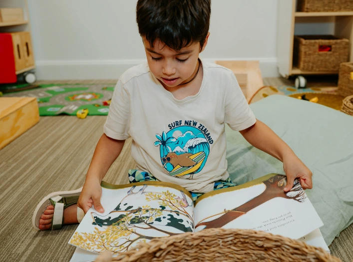 Children and educators creating Connection Floor Books