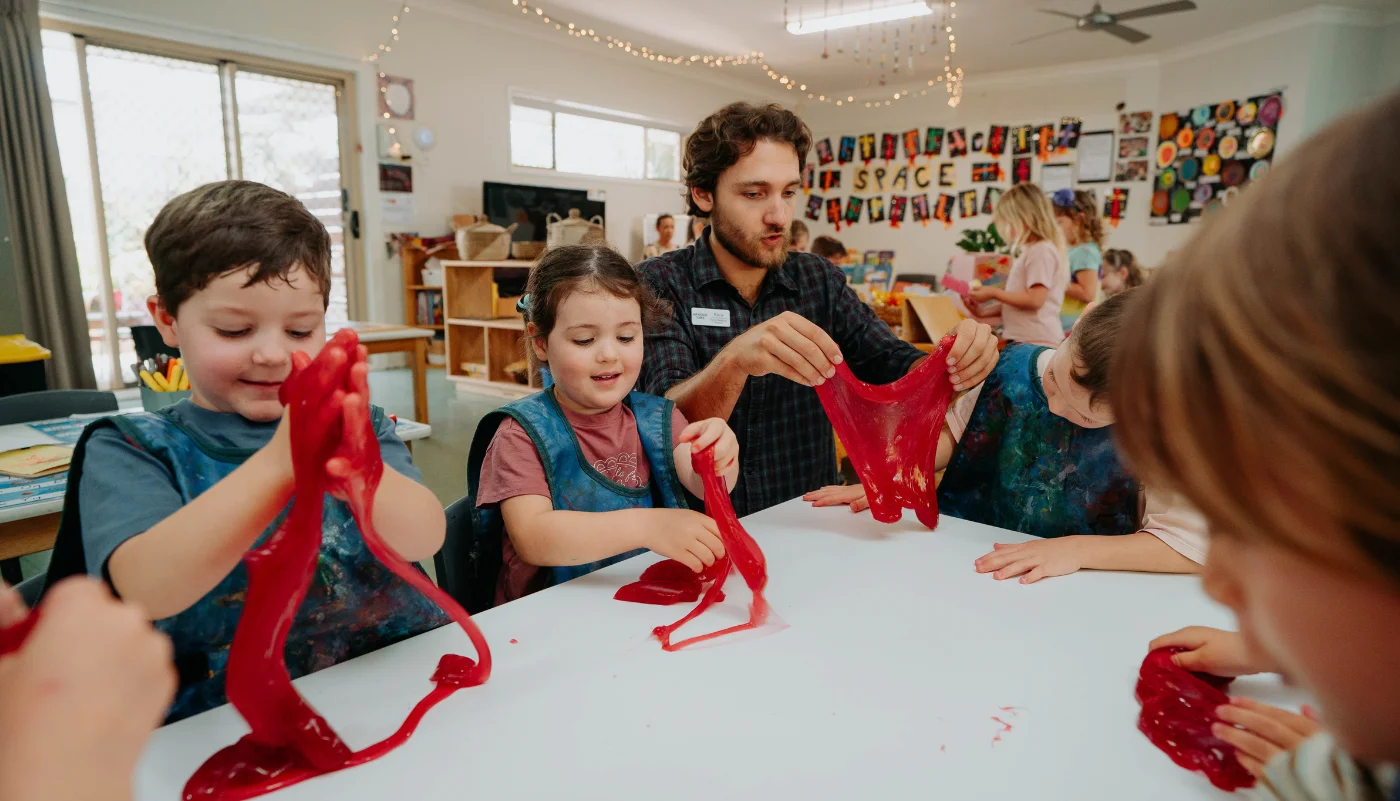 Children connecting and playing in a natural early learning environment